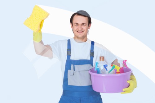 Professional carpet cleaner treating a stained carpet