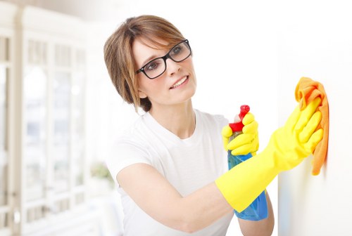 Carpet cleaner preparing equipment safely in a Brimsdown property