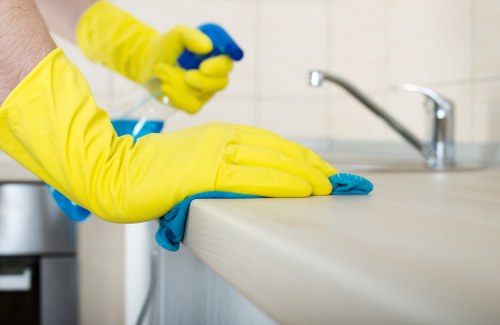 Professional carpet cleaning team following safety procedures