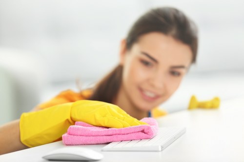 Cleaning technician reviewing a safety checklist during carpet cleaning
